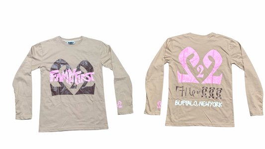Two beige long-sleeve shirts with pink and brown designs on a white background